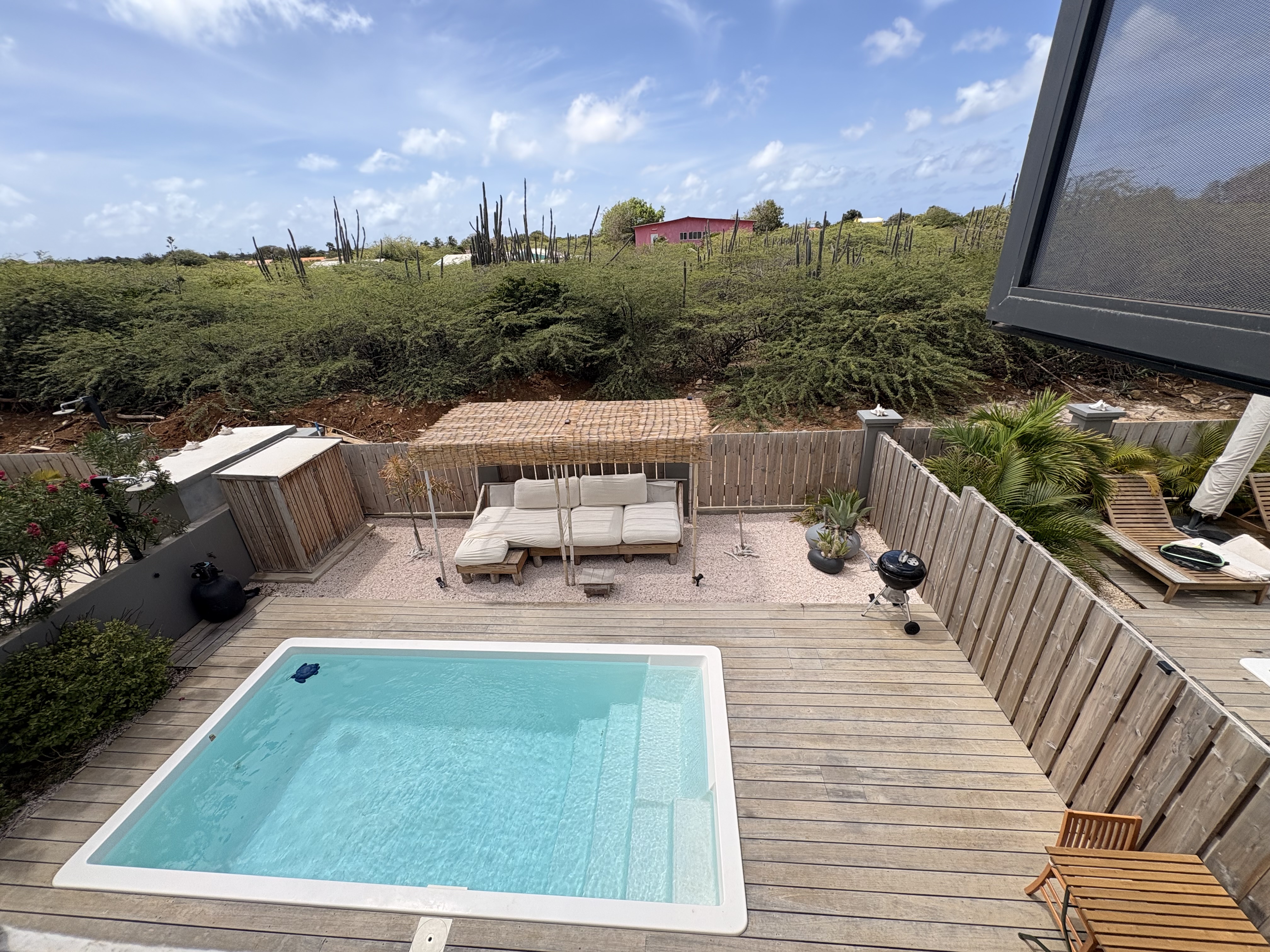 Pool and outdoor deck from above